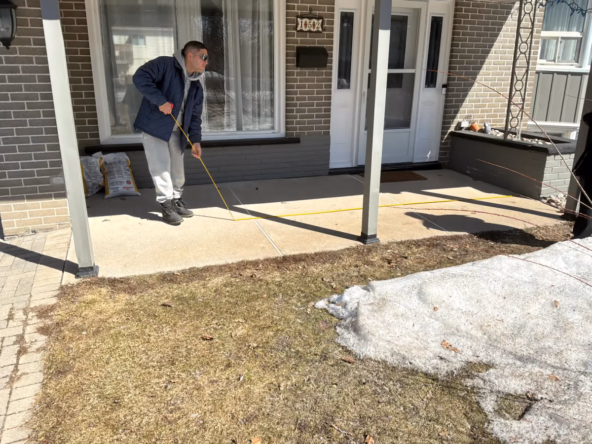 Existing residential conditions being measured for permit drawings
